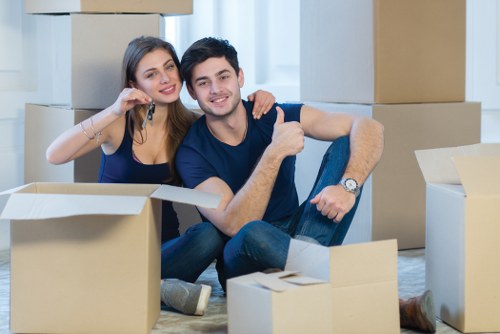 Man and van removals team loading furniture in Croydon