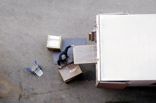 Removal team planning a move in a Croydon residential street