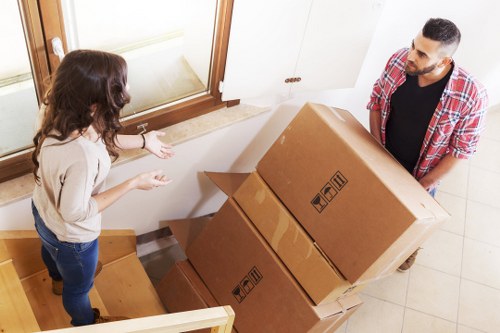Packed office furniture and boxes ready for transport